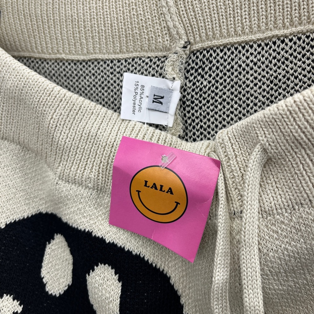 Women’s Dressed in LALA Off White and Black Smiley Face Cropped Jogger Pants - Picture 7 of 8